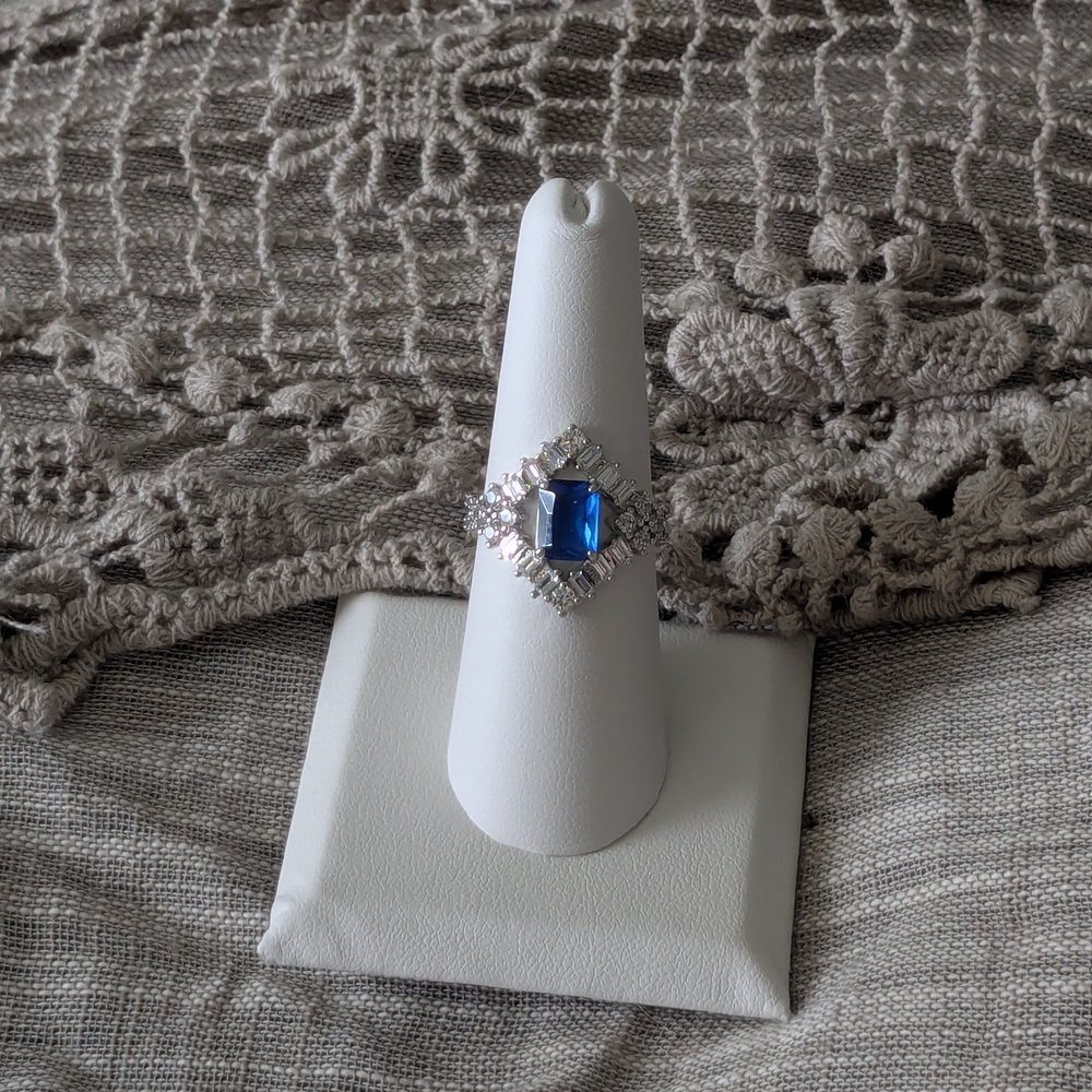 Elegant Blue Gemstone Ring with Silver Accents